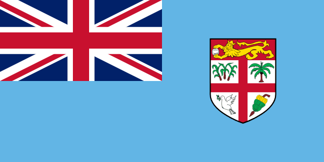 Flag of Fiji — light blue ensign with shield containing dove British lion and sugarcane imagery